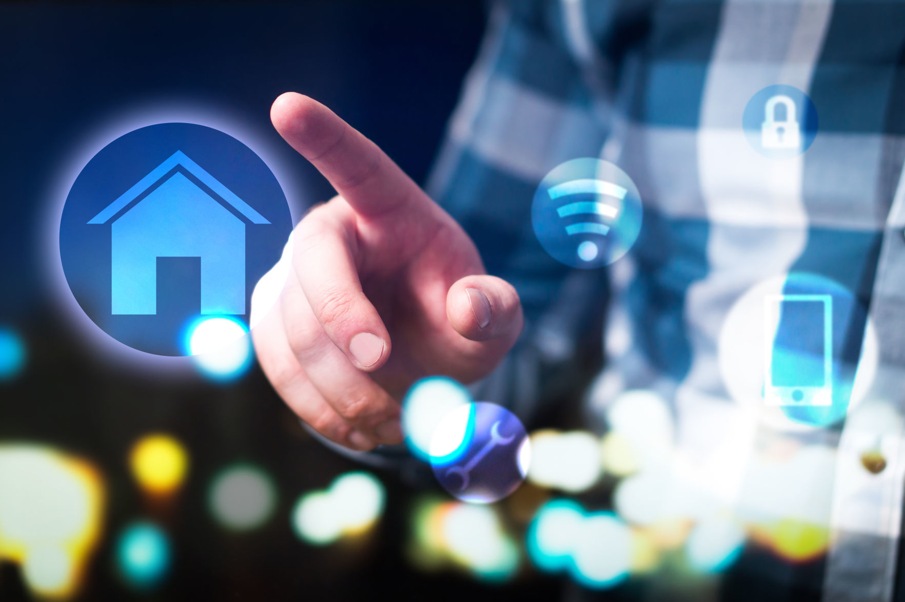 Smart home and internet of things (IOT) concept. Man using modern house security, connection and control system.